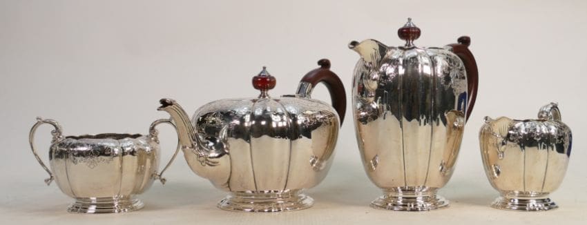 Lot-1568-Silver-four-piece-decorative-tea-set A silver four-piece decorative tea set hallmarked for Birmingham 1958