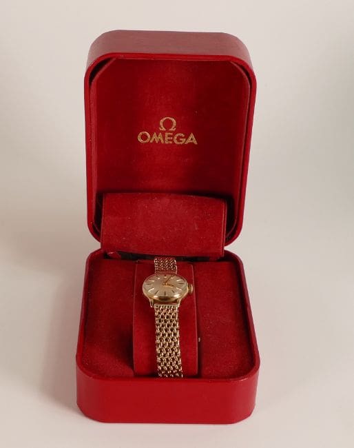 Lot-716-9ct-gold-ladies-Omega-wristwatch-with-bracelet A 9ct gold ladies Omega wristwatch with a 9ct gold bracelet