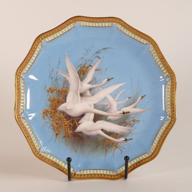 Lot-1317-Royal-Worcester-gilded-shaped-plate-hand-painted-swans A Royal Worcester gilded shaped plate, hand-painted with swans by C Baldwyn