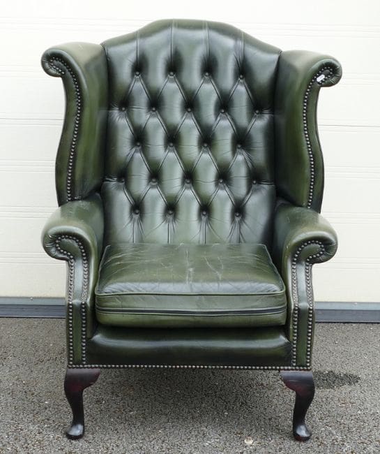 Lot-1490-Green-leather-Queen-Anne-Chesterfield-high-back-armchair A green leather Queen Anne Chesterfield high back armchair