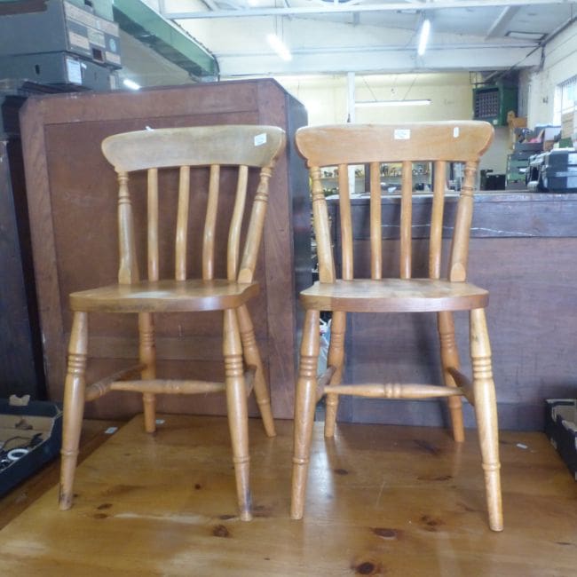 Lot-659e-Pine-Farmhouse-Style-Kitchen-Dining-Chairs Two pine farmhouse-style kitchen dining chairs