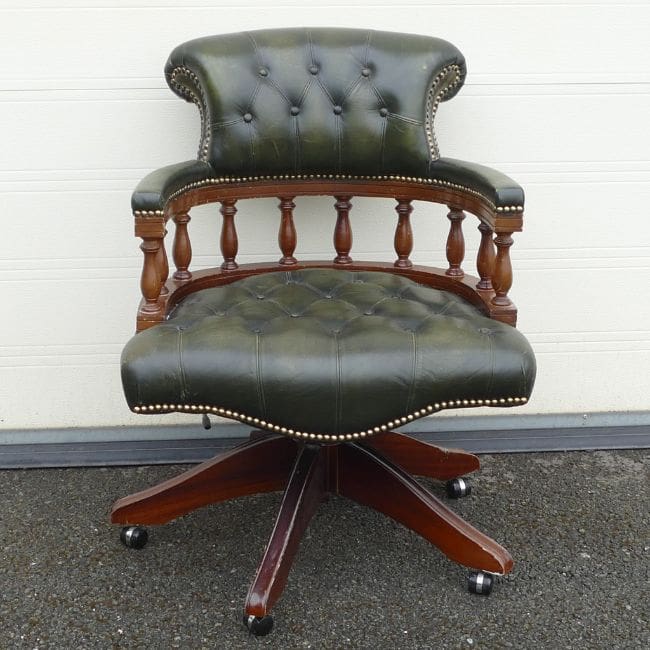 Chesterfield green leather swivel armchair