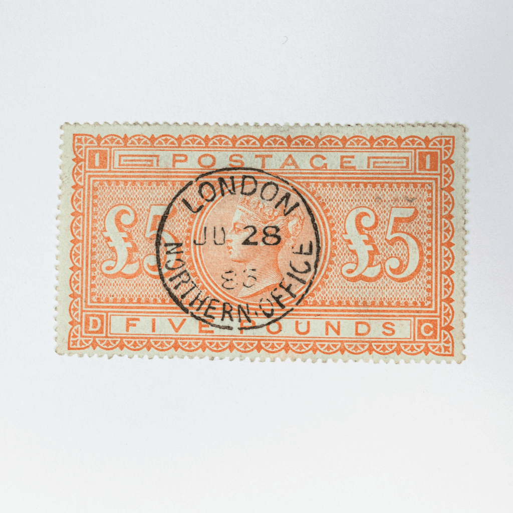 GB £5 five pounds orange stamp, SG133 used.  Purchased from a PTS dealer for £4350 in 2014 for £4350, together with RPS certificate declaring the stamp genuine, in 1990.  London CDS.